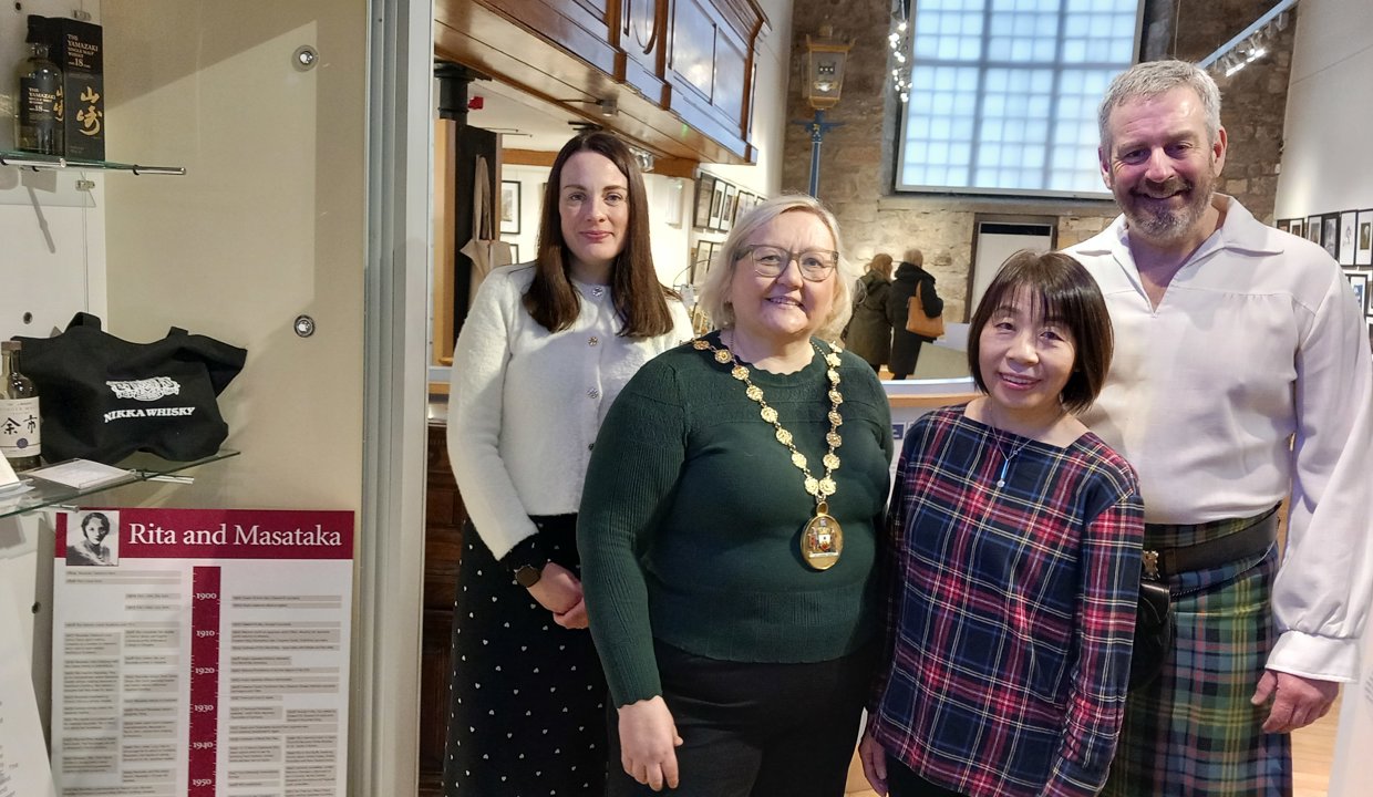 Standing next to the Rita and Masataka display in the Auld Kirk Museum: Depute Provost Colette McDiarmid, Provost Gillian Renwick, Naoko Nakamato and Jimmy Watson